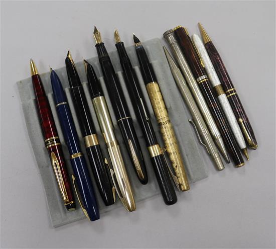 Various gold-nibbed fountain pens, including Sheaffer and Swan and propelling pencils etc